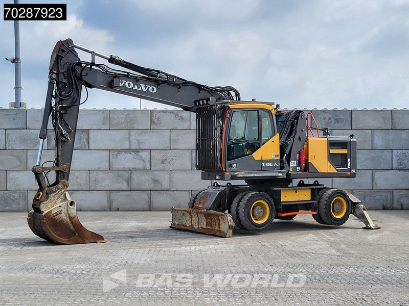 Volvo EW220 E - Bager na kotačima: slika Volvo EW220 E - Bager na kotačima Volvo EW220 E - Bager na kotačima: slika Volvo EW220 E - Bager na kotačima