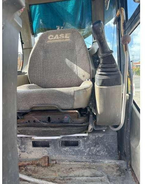 Case WX185 - Bager na kotačima: slika Case WX185 - Bager na kotačima Case WX185 - Bager na kotačima: slika Case WX185 - Bager na kotačima