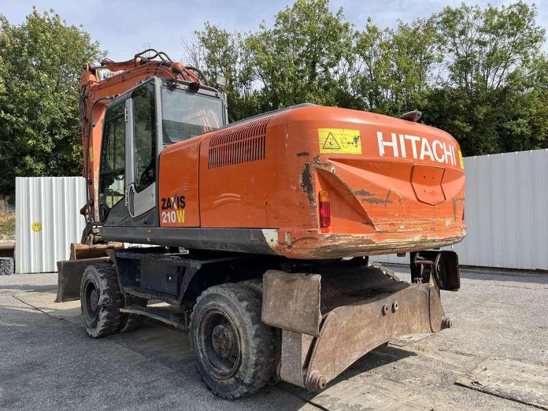 Hitachi ZX210W-3 - Bager na kotačima: slika Hitachi ZX210W-3 - Bager na kotačima Hitachi ZX210W-3 - Bager na kotačima: slika Hitachi ZX210W-3 - Bager na kotačima