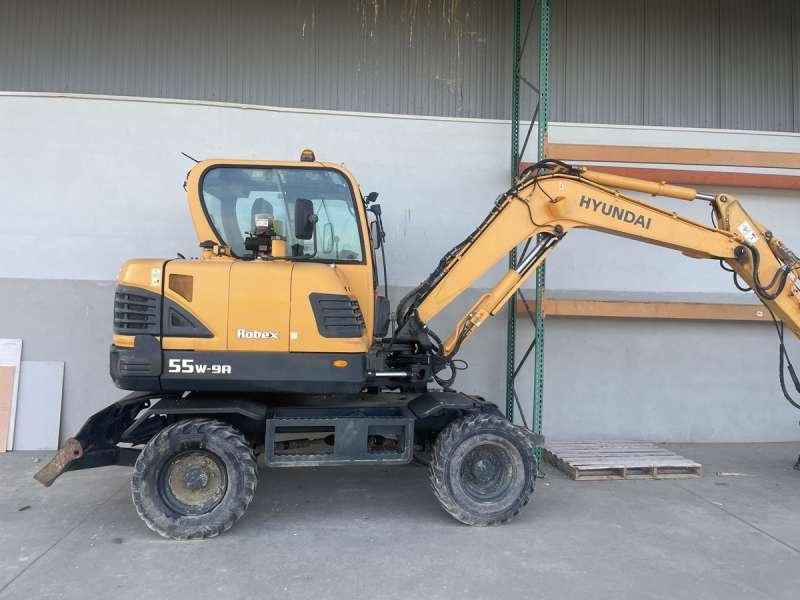 Hyundai Pelle sur Pneus R55W-9A - Bager na kotačima: slika Hyundai Pelle sur Pneus R55W-9A - Bager na kotačima Hyundai Pelle sur Pneus R55W-9A - Bager na kotačima: slika Hyundai Pelle sur Pneus R55W-9A - Bager na kotačima