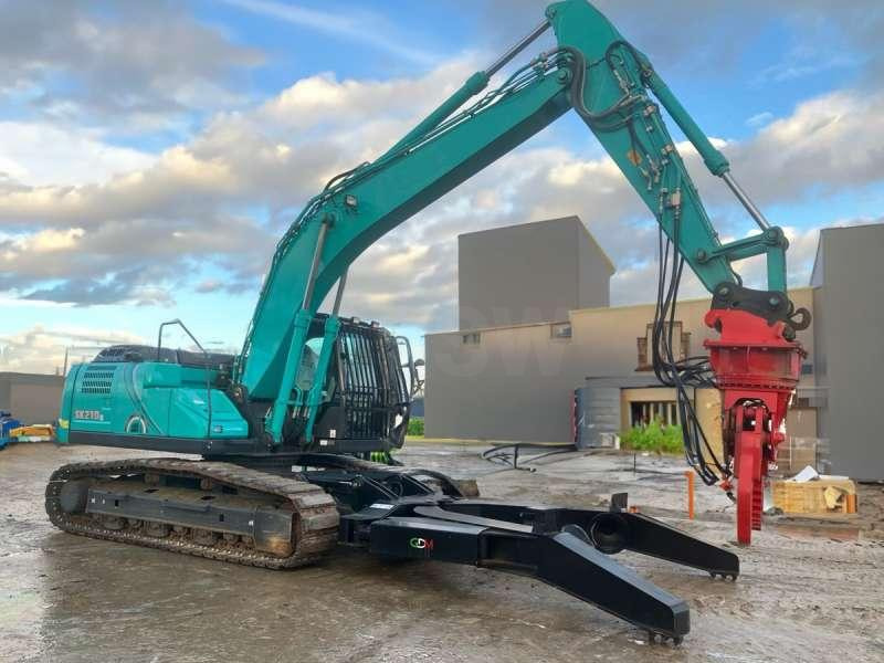 Kobelco SK210LC-10E - Stroj za rukovanje otpadom: slika Kobelco SK210LC-10E - Stroj za rukovanje otpadom Kobelco SK210LC-10E - Stroj za rukovanje otpadom: slika Kobelco SK210LC-10E - Stroj za rukovanje otpadom