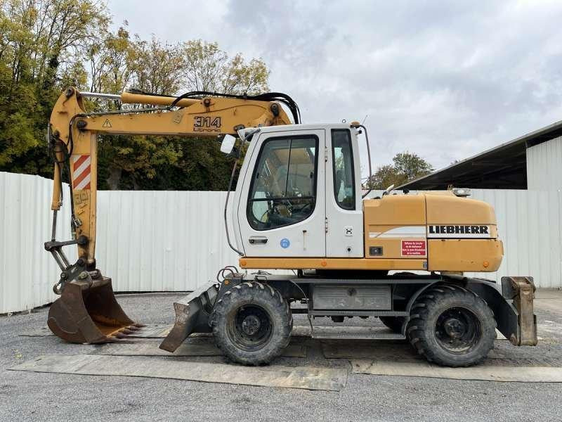 Liebherr A314 Litronic - Bager na kotačima: slika Liebherr A314 Litronic - Bager na kotačima Liebherr A314 Litronic - Bager na kotačima: slika Liebherr A314 Litronic - Bager na kotačima