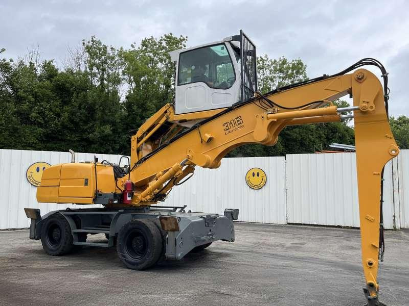 Liebherr A316 LITRONIC - Stroj za rukovanje otpadom: slika Liebherr A316 LITRONIC - Stroj za rukovanje otpadom Liebherr A316 LITRONIC - Stroj za rukovanje otpadom: slika Liebherr A316 LITRONIC - Stroj za rukovanje otpadom