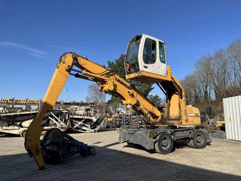 Liebherr A316 LITRONIC - Stroj za rukovanje otpadom: slika Liebherr A316 LITRONIC - Stroj za rukovanje otpadom Liebherr A316 LITRONIC - Stroj za rukovanje otpadom: slika Liebherr A316 LITRONIC - Stroj za rukovanje otpadom
