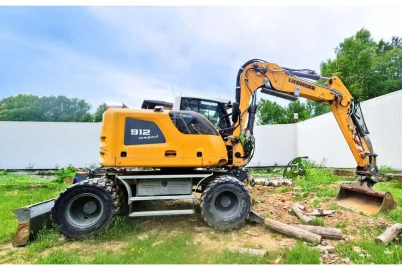 Liebherr A912 COMPACT - Bager na kotačima: slika Liebherr A912 COMPACT - Bager na kotačima Liebherr A912 COMPACT - Bager na kotačima: slika Liebherr A912 COMPACT - Bager na kotačima