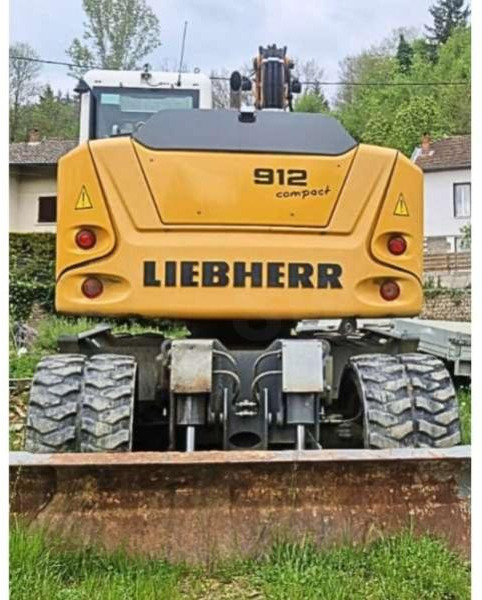 Liebherr A912 COMPACT - Bager na kotačima: slika Liebherr A912 COMPACT - Bager na kotačima Liebherr A912 COMPACT - Bager na kotačima: slika Liebherr A912 COMPACT - Bager na kotačima