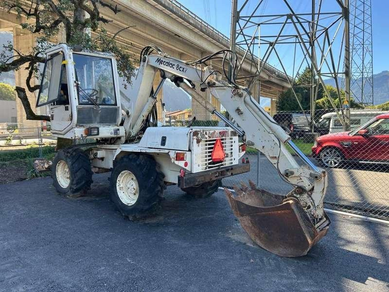 Mecalac 8CXI - Bager na kotačima: slika Mecalac 8CXI - Bager na kotačima Mecalac 8CXI - Bager na kotačima: slika Mecalac 8CXI - Bager na kotačima