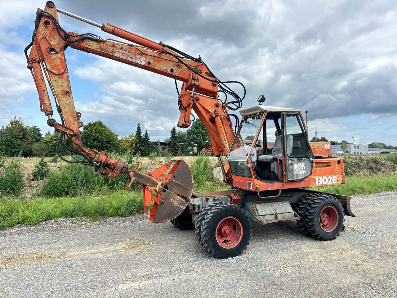 Atlas MOBILBAGGER 1302 E - Bager na kotačima: slika Atlas MOBILBAGGER 1302 E - Bager na kotačima Atlas MOBILBAGGER 1302 E - Bager na kotačima: slika Atlas MOBILBAGGER 1302 E - Bager na kotačima