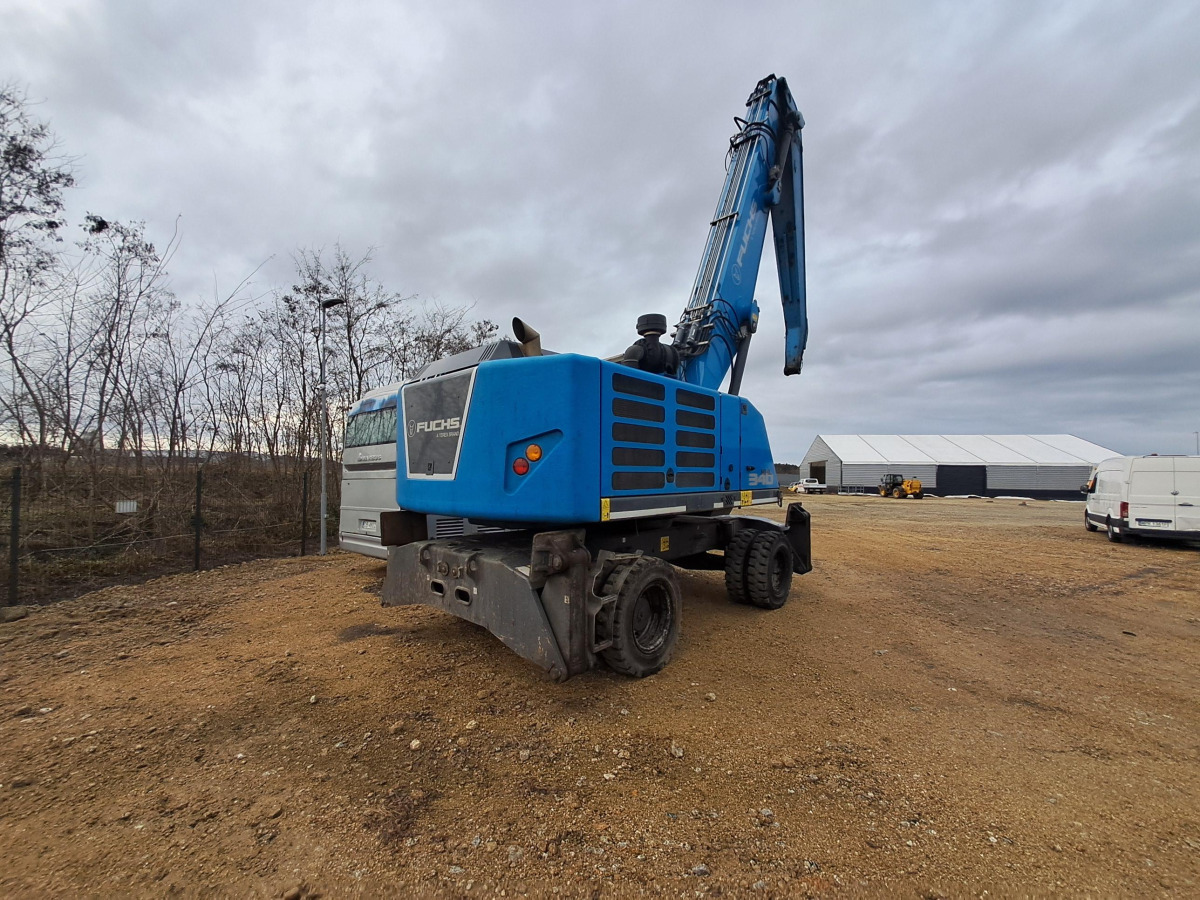 FUCHS material handling excavator / 2022 / joystick control - Stroj za rukovanje otpadom: slika FUCHS material handling excavator / 2022 / joystick control - Stroj za rukovanje otpadom FUCHS material handling excavator / 2022 / joystick control - Stroj za rukovanje otpadom: slika FUCHS material handling excavator / 2022 / joystick control - Stroj za rukovanje otpadom