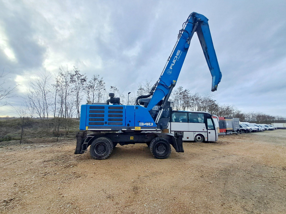 FUCHS material handling excavator / 2022 / joystick control - Stroj za rukovanje otpadom: slika FUCHS material handling excavator / 2022 / joystick control - Stroj za rukovanje otpadom FUCHS material handling excavator / 2022 / joystick control - Stroj za rukovanje otpadom: slika FUCHS material handling excavator / 2022 / joystick control - Stroj za rukovanje otpadom