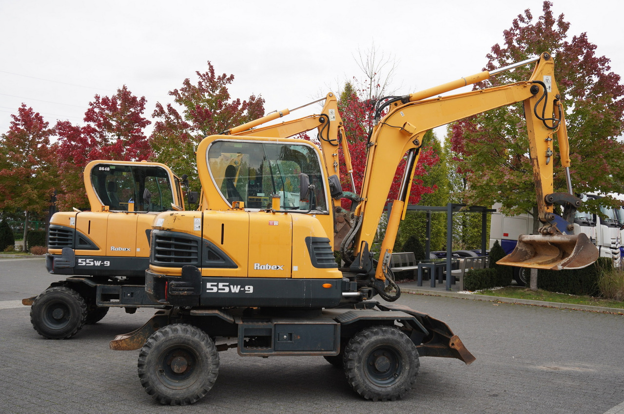 Hyundai Robex 55W-9 Wheeled Excavator 5.5t / 2pcs - Mini bager: slika Hyundai Robex 55W-9 Wheeled Excavator 5.5t / 2pcs - Mini bager Hyundai Robex 55W-9 Wheeled Excavator 5.5t / 2pcs - Mini bager: slika Hyundai Robex 55W-9 Wheeled Excavator 5.5t / 2pcs - Mini bager