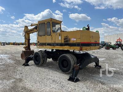 CAT 214BFT - Bager na kotačima: slika CAT 214BFT - Bager na kotačima CAT 214BFT - Bager na kotačima: slika CAT 214BFT - Bager na kotačima