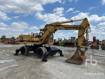 CAT 214BFT - Bager na kotačima: slika CAT 214BFT - Bager na kotačima CAT 214BFT - Bager na kotačima: slika CAT 214BFT - Bager na kotačima