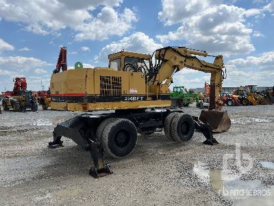 CAT 214BFT - Bager na kotačima: slika CAT 214BFT - Bager na kotačima CAT 214BFT - Bager na kotačima: slika CAT 214BFT - Bager na kotačima