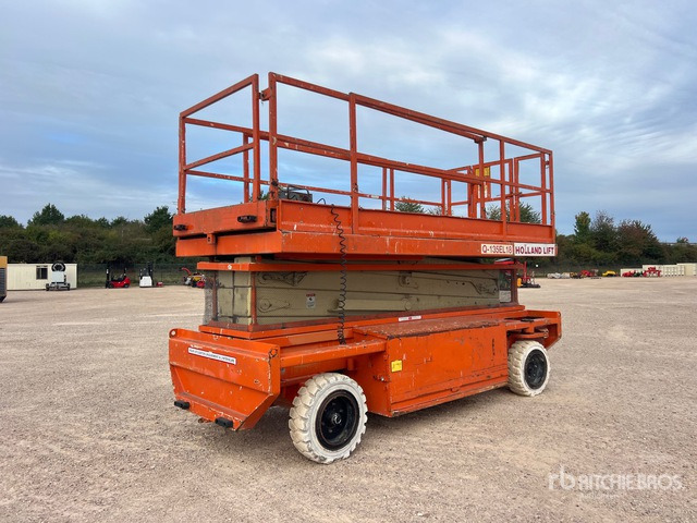 2002 Holland Lift Q135EL18 Electric Nacelle Ciseaux Electrique Scissor Lift - Škarasta podizna platforma: slika 2002 Holland Lift Q135EL18 Electric Nacelle Ciseaux Electrique Scissor Lift - Škarasta podizna platforma 2002 Holland Lift Q135EL18 Electric Nacelle Ciseaux Electrique Scissor Lift - Škarasta podizna platforma: slika 2002 Holland Lift Q135EL18 Electric Nacelle Ciseaux Electrique Scissor Lift - Škarasta podizna platforma