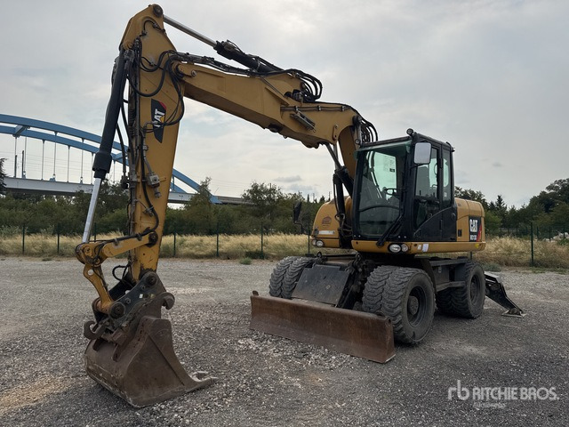 2012 Cat M313D Pelle Sur Pneus Wheel Excavator - Bager na kotačima: slika 2012 Cat M313D Pelle Sur Pneus Wheel Excavator - Bager na kotačima 2012 Cat M313D Pelle Sur Pneus Wheel Excavator - Bager na kotačima: slika 2012 Cat M313D Pelle Sur Pneus Wheel Excavator - Bager na kotačima