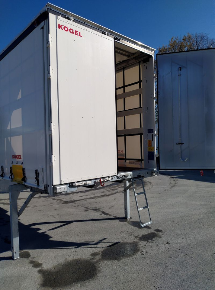 Kögel BDF-System, 7.450 mm lang. - Izmjenjivi sanduk s bočnom kliznom ceradom: slika Kögel BDF-System, 7.450 mm lang. - Izmjenjivi sanduk s bočnom kliznom ceradom Kögel BDF-System, 7.450 mm lang. - Izmjenjivi sanduk s bočnom kliznom ceradom: slika Kögel BDF-System, 7.450 mm lang. - Izmjenjivi sanduk s bočnom kliznom ceradom