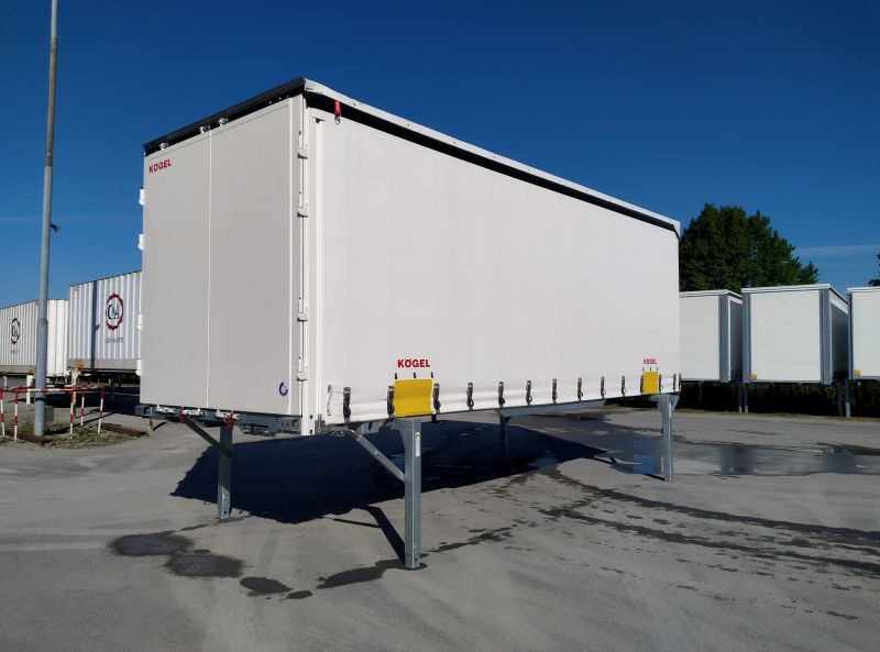 Kögel BDF-System, 7.450 mm lang. - Izmjenjivi sanduk s bočnom kliznom ceradom: slika Kögel BDF-System, 7.450 mm lang. - Izmjenjivi sanduk s bočnom kliznom ceradom Kögel BDF-System, 7.450 mm lang. - Izmjenjivi sanduk s bočnom kliznom ceradom: slika Kögel BDF-System, 7.450 mm lang. - Izmjenjivi sanduk s bočnom kliznom ceradom