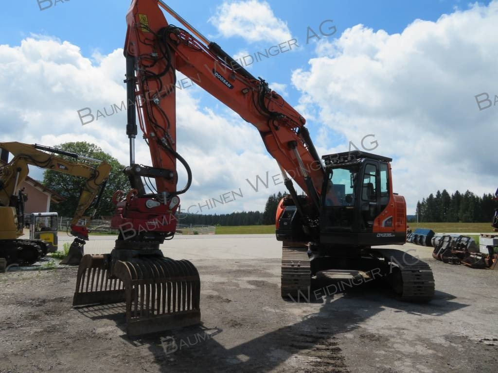 Doosan DX 235 LCR-5 - Bager gusjeničar: slika Doosan DX 235 LCR-5 - Bager gusjeničar Doosan DX 235 LCR-5 - Bager gusjeničar: slika Doosan DX 235 LCR-5 - Bager gusjeničar