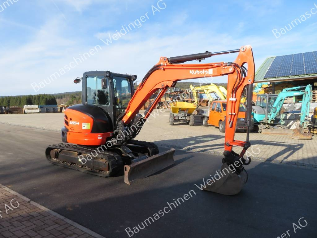 Kubota U 55-4 - Mini bager: slika Kubota U 55-4 - Mini bager Kubota U 55-4 - Mini bager: slika Kubota U 55-4 - Mini bager