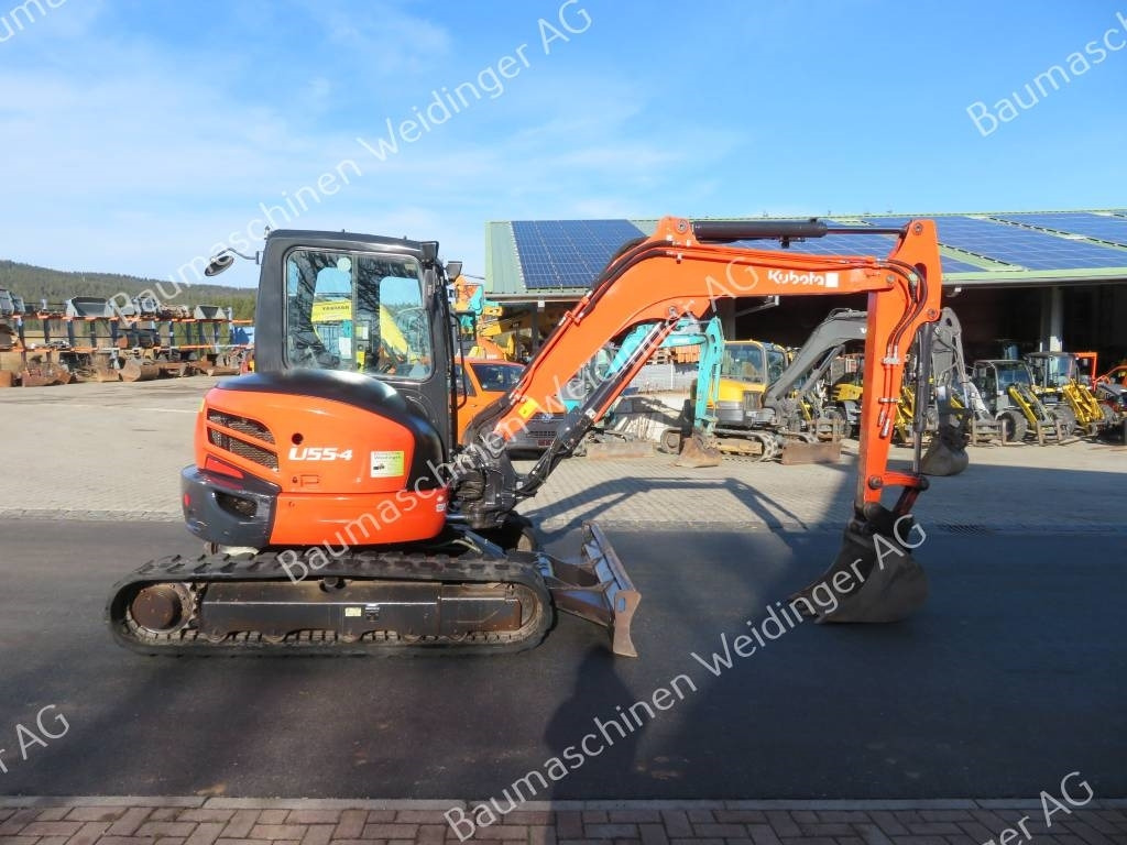 Kubota U 55-4 - Mini bager: slika Kubota U 55-4 - Mini bager Kubota U 55-4 - Mini bager: slika Kubota U 55-4 - Mini bager