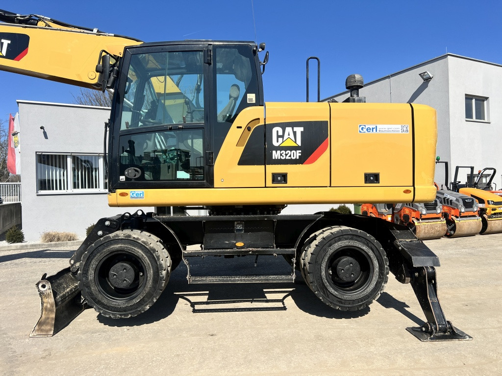 Caterpillar M 320 F (111527) - Bager na kotačima: slika Caterpillar M 320 F (111527) - Bager na kotačima Caterpillar M 320 F (111527) - Bager na kotačima: slika Caterpillar M 320 F (111527) - Bager na kotačima