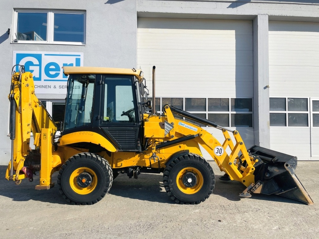 JCB 2CX SM 4WS (4001) - Rovokopač-utovarivač: slika JCB 2CX SM 4WS (4001) - Rovokopač-utovarivač JCB 2CX SM 4WS (4001) - Rovokopač-utovarivač: slika JCB 2CX SM 4WS (4001) - Rovokopač-utovarivač