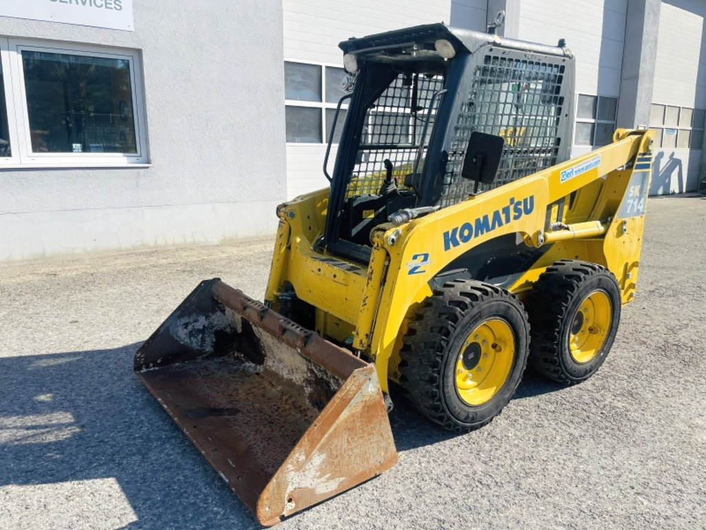 Komatsu SK714 (4077) - Mini utovarivač: slika Komatsu SK714 (4077) - Mini utovarivač Komatsu SK714 (4077) - Mini utovarivač: slika Komatsu SK714 (4077) - Mini utovarivač