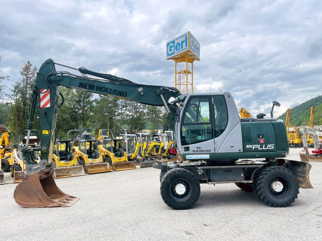 New Holland MH Plus (4054) - Bager na kotačima: slika New Holland MH Plus (4054) - Bager na kotačima New Holland MH Plus (4054) - Bager na kotačima: slika New Holland MH Plus (4054) - Bager na kotačima