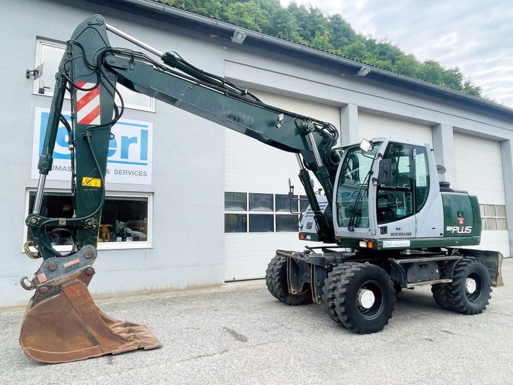 New Holland MH Plus (4054) - Bager na kotačima: slika New Holland MH Plus (4054) - Bager na kotačima New Holland MH Plus (4054) - Bager na kotačima: slika New Holland MH Plus (4054) - Bager na kotačima