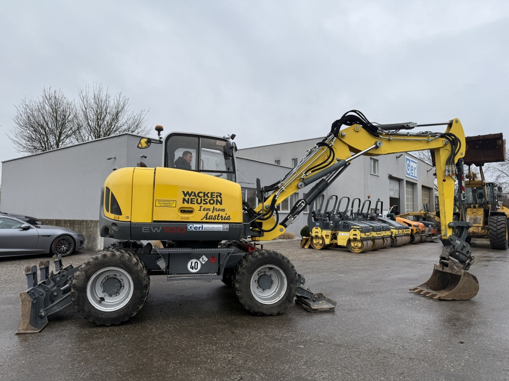 Wacker Neuson EW 100 (111768) - Bager na kotačima: slika Wacker Neuson EW 100 (111768) - Bager na kotačima Wacker Neuson EW 100 (111768) - Bager na kotačima: slika Wacker Neuson EW 100 (111768) - Bager na kotačima