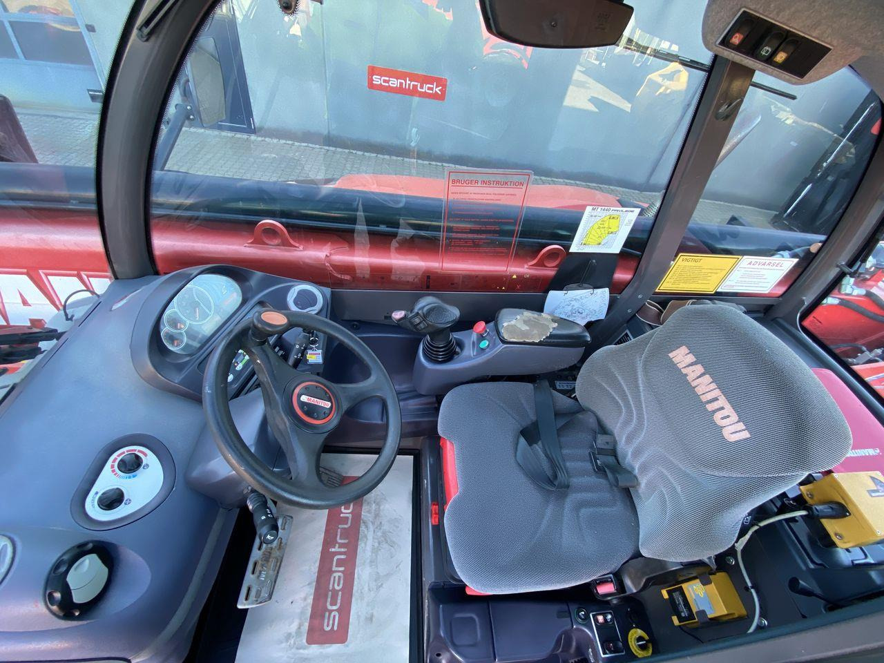 Manitou MT1440A ST3B - Teleskopski rukovatelj: slika Manitou MT1440A ST3B - Teleskopski rukovatelj Manitou MT1440A ST3B - Teleskopski rukovatelj: slika Manitou MT1440A ST3B - Teleskopski rukovatelj