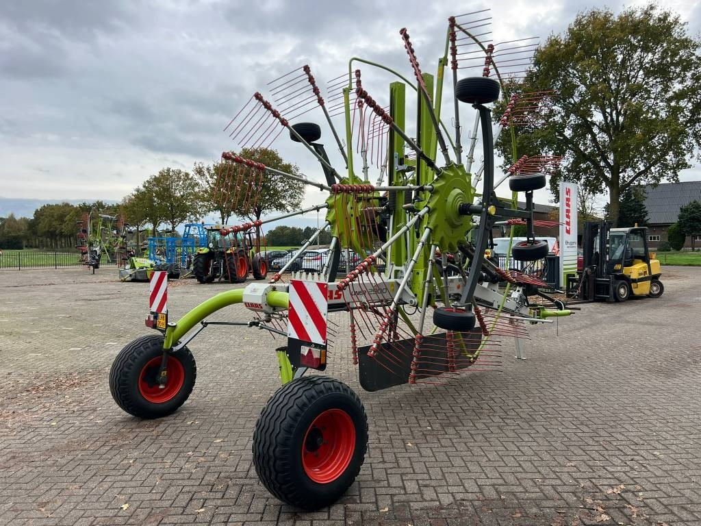 Claas Liner 2900 - Prevrtač sijena/ Grabulje: slika Claas Liner 2900 - Prevrtač sijena/ Grabulje Claas Liner 2900 - Prevrtač sijena/ Grabulje: slika Claas Liner 2900 - Prevrtač sijena/ Grabulje