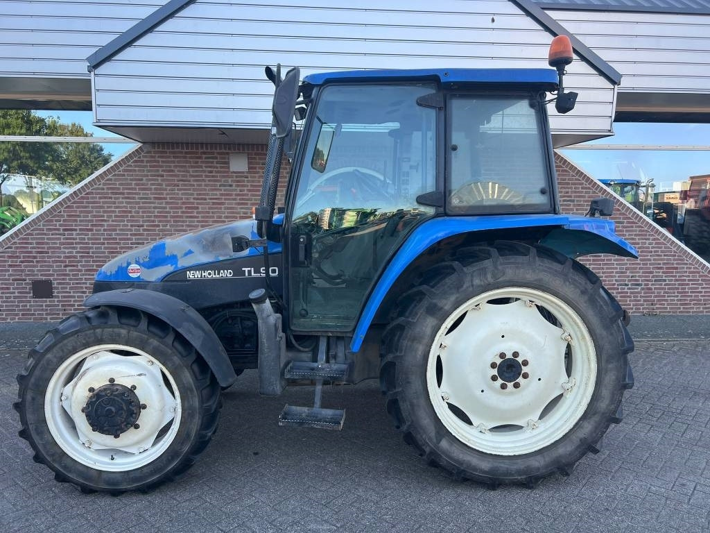 New Holland TL 90 - Traktor: slika New Holland TL 90 - Traktor New Holland TL 90 - Traktor: slika New Holland TL 90 - Traktor