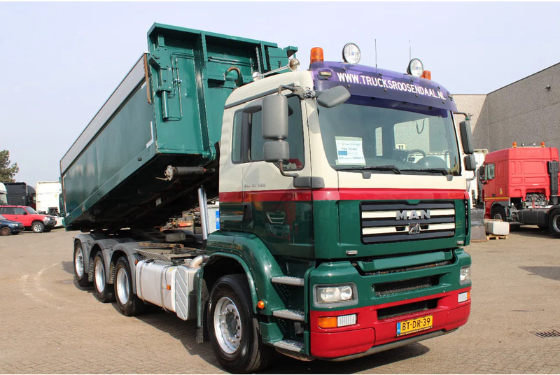 MAN TGA 35.400 8X4 + MANUAL! + NCH kipper/ bitum sprayer - Kamion s kabelskim sustavom: slika MAN TGA 35.400 8X4 + MANUAL! + NCH kipper/ bitum sprayer - Kamion s kabelskim sustavom MAN TGA 35.400 8X4 + MANUAL! + NCH kipper/ bitum sprayer - Kamion s kabelskim sustavom: slika MAN TGA 35.400 8X4 + MANUAL! + NCH kipper/ bitum sprayer - Kamion s kabelskim sustavom