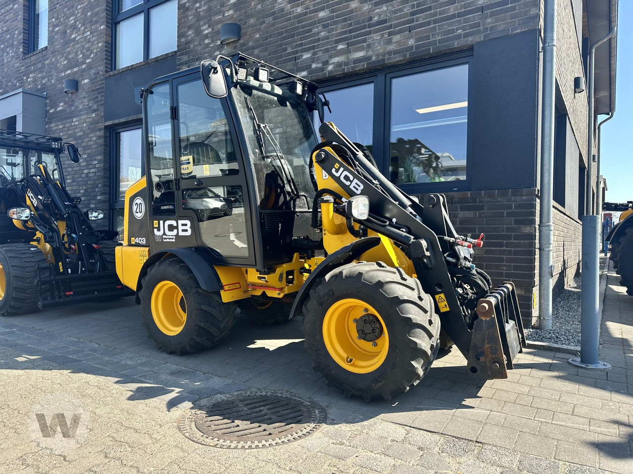 JCB 403 AGRI - Zglobni utovarivač: slika JCB 403 AGRI - Zglobni utovarivač JCB 403 AGRI - Zglobni utovarivač: slika JCB 403 AGRI - Zglobni utovarivač