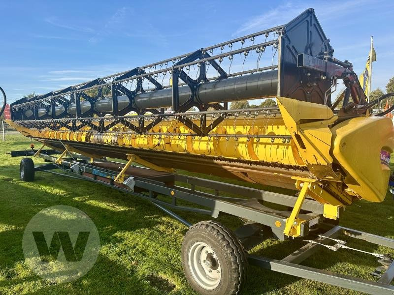 New Holland Schneidwerk 10,70 m - Heder za kombajn: slika New Holland Schneidwerk 10,70 m - Heder za kombajn New Holland Schneidwerk 10,70 m - Heder za kombajn: slika New Holland Schneidwerk 10,70 m - Heder za kombajn