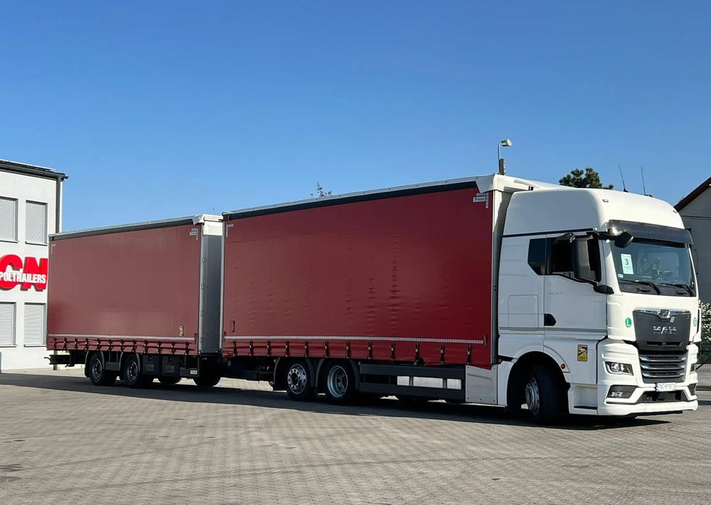 MAN TGX 26.470 z przyczepą Redos - Kamion s ceradom: slika MAN TGX 26.470 z przyczepą Redos - Kamion s ceradom MAN TGX 26.470 z przyczepą Redos - Kamion s ceradom: slika MAN TGX 26.470 z przyczepą Redos - Kamion s ceradom