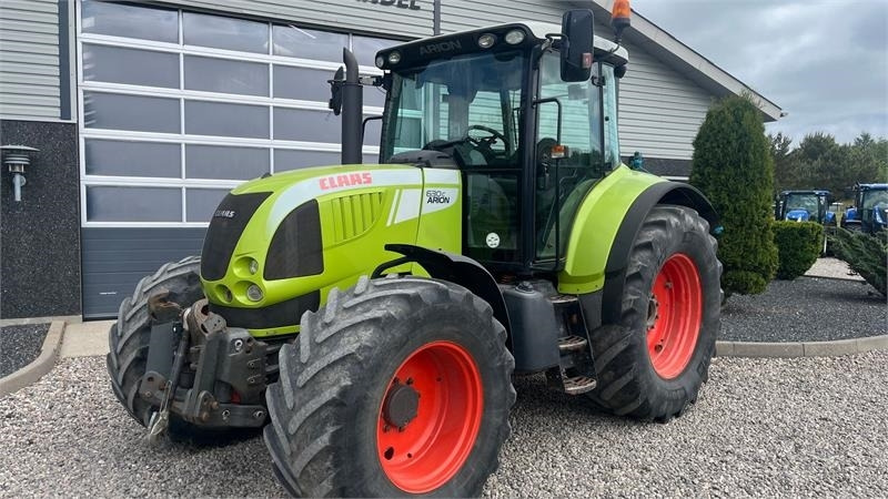 Claas Arion 630C Med frontlift - Traktor: slika Claas Arion 630C Med frontlift - Traktor Claas Arion 630C Med frontlift - Traktor: slika Claas Arion 630C Med frontlift - Traktor