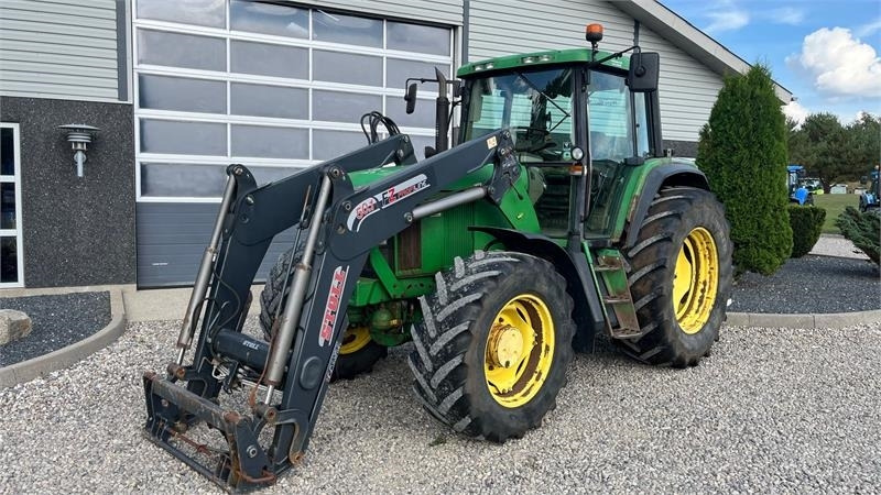 John Deere 6910 Auto Quad II-TLS Med frontlæsser - Traktor: slika John Deere 6910 Auto Quad II-TLS Med frontlæsser - Traktor John Deere 6910 Auto Quad II-TLS Med frontlæsser - Traktor: slika John Deere 6910 Auto Quad II-TLS Med frontlæsser - Traktor