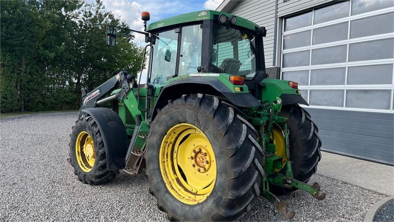 John Deere 6910 Auto Quad II-TLS Med frontlæsser - Traktor: slika John Deere 6910 Auto Quad II-TLS Med frontlæsser - Traktor John Deere 6910 Auto Quad II-TLS Med frontlæsser - Traktor: slika John Deere 6910 Auto Quad II-TLS Med frontlæsser - Traktor