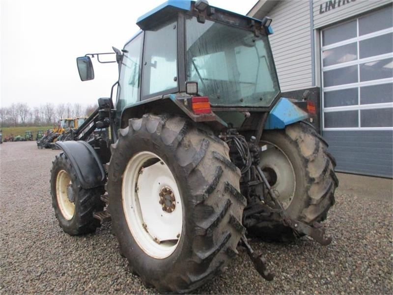New Holland 7740 SLE Turbo Med frontlæsser og frontlift. - Traktor: slika New Holland 7740 SLE Turbo Med frontlæsser og frontlift. - Traktor New Holland 7740 SLE Turbo Med frontlæsser og frontlift. - Traktor: slika New Holland 7740 SLE Turbo Med frontlæsser og frontlift. - Traktor