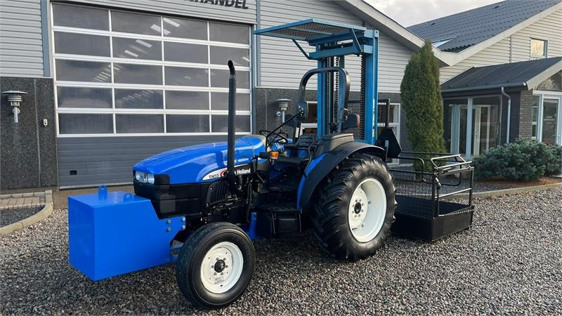 New Holland TN55D Med Byggelift - Traktor: slika New Holland TN55D Med Byggelift - Traktor New Holland TN55D Med Byggelift - Traktor: slika New Holland TN55D Med Byggelift - Traktor