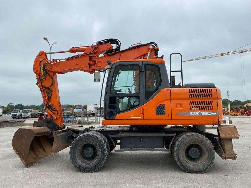 Doosan DX160 - Bager na kotačima: slika Doosan DX160 - Bager na kotačima Doosan DX160 - Bager na kotačima: slika Doosan DX160 - Bager na kotačima