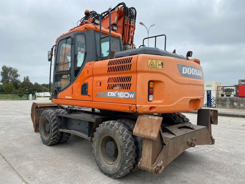 Doosan DX160 - Bager na kotačima: slika Doosan DX160 - Bager na kotačima Doosan DX160 - Bager na kotačima: slika Doosan DX160 - Bager na kotačima
