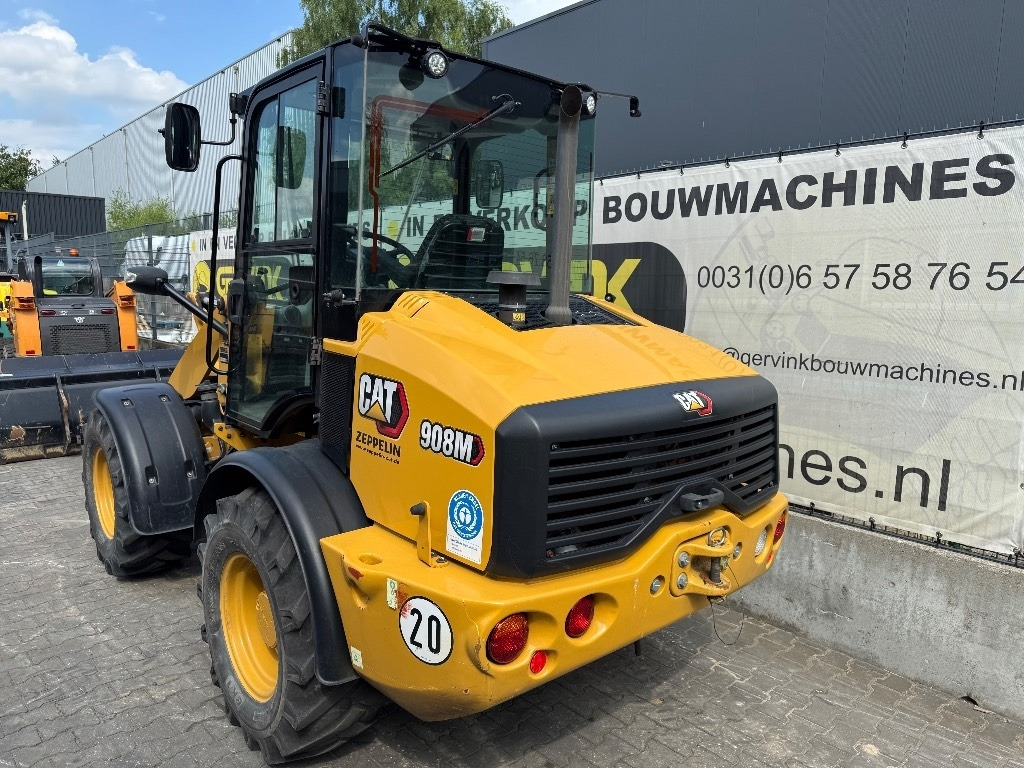 CAT 908 M - Utovarivač na kotačima: slika CAT 908 M - Utovarivač na kotačima CAT 908 M - Utovarivač na kotačima: slika CAT 908 M - Utovarivač na kotačima