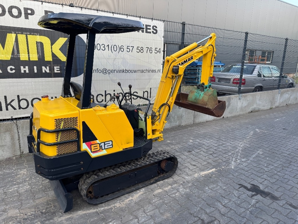 Yanmar B12 - Mini bager: slika Yanmar B12 - Mini bager Yanmar B12 - Mini bager: slika Yanmar B12 - Mini bager