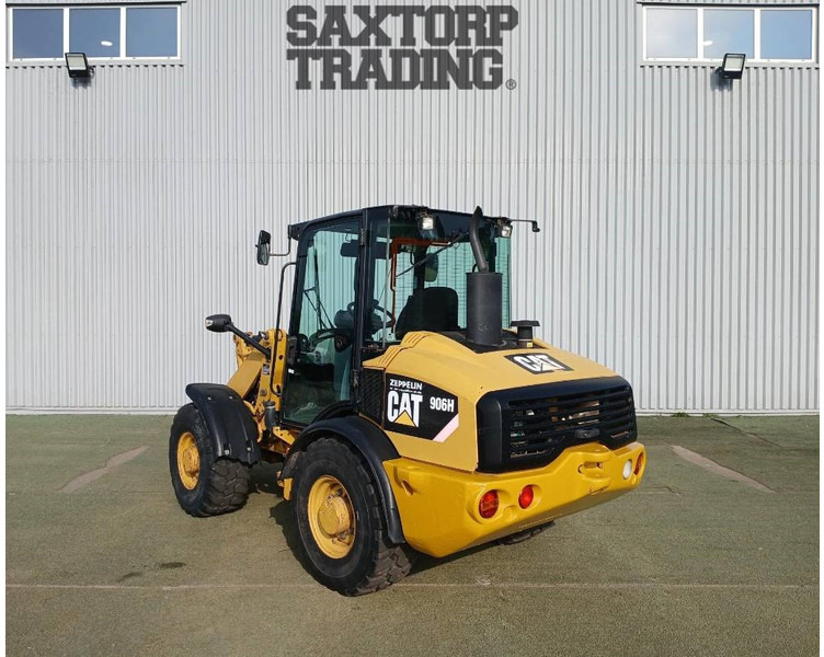 Cat 906H, Hjullastare - Utovarivač na kotačima: slika Cat 906H, Hjullastare - Utovarivač na kotačima Cat 906H, Hjullastare - Utovarivač na kotačima: slika Cat 906H, Hjullastare - Utovarivač na kotačima