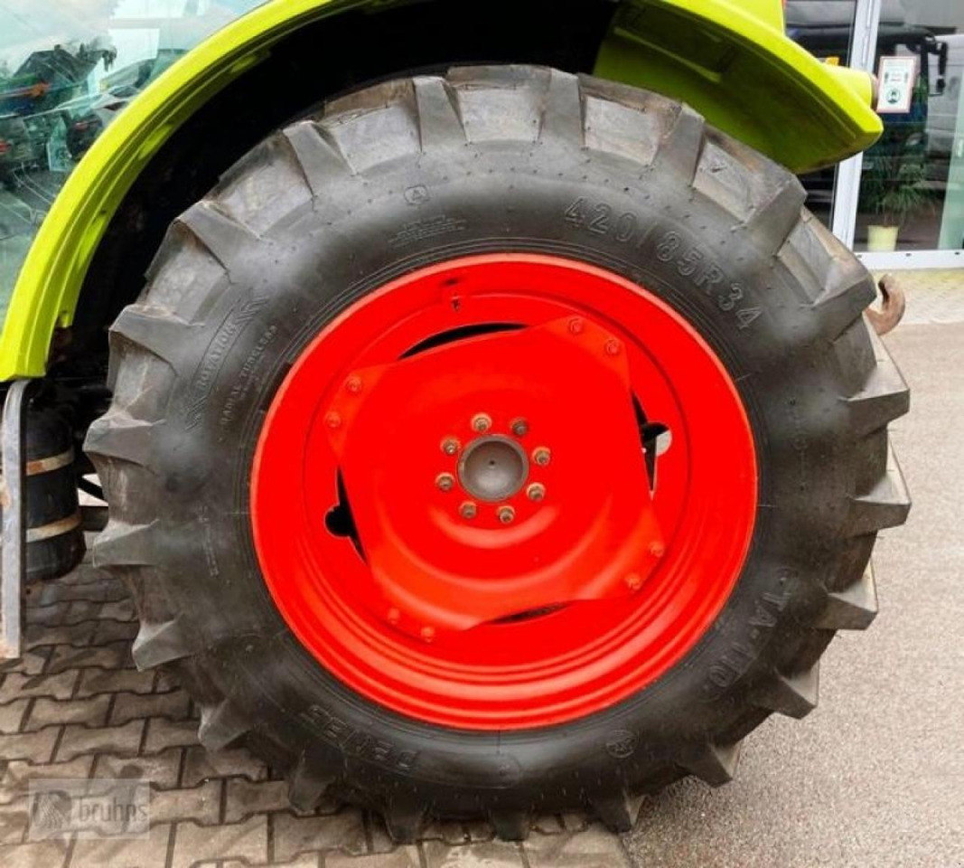 Traktor CLAAS axos 320 mit stoll frontlader: slika Traktor CLAAS axos 320 mit stoll frontlader