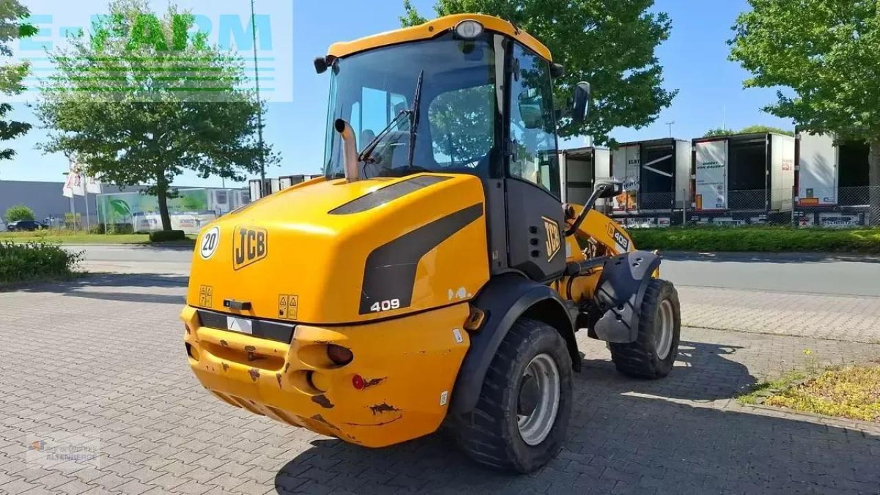 JCB 409 - Mini bager: slika JCB 409 - Mini bager JCB 409 - Mini bager: slika JCB 409 - Mini bager
